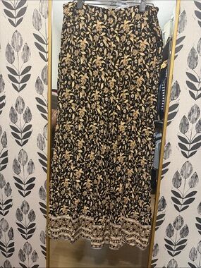 Rip Curl Black wide leg “fun” pants with Gold Floral Motif